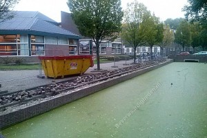 Toplaag vernieuwd muurtje Oude Watering