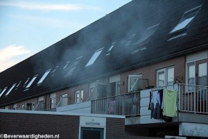 Rookontwikkeling achterzijde woning